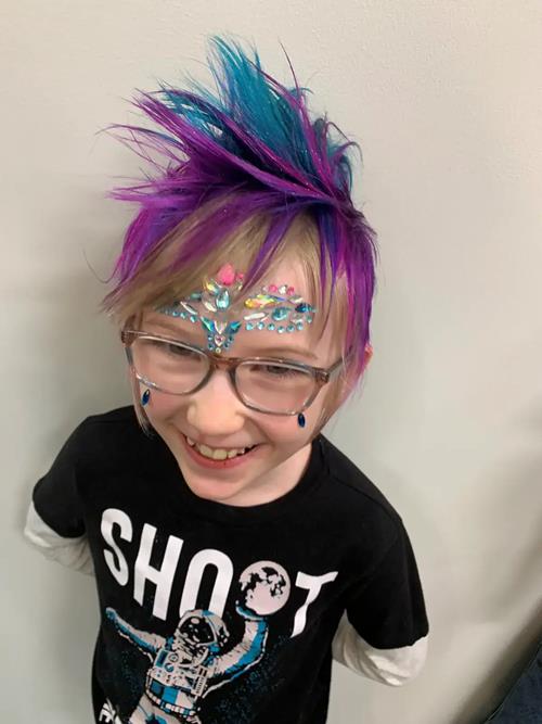 Hair Extensions photo, Denver Colorado. We also added some fun gemstones on her forehead because it (..)